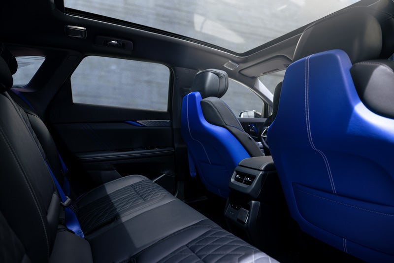 Back Seat View of the 2026 OPTIQ-V Blue Front Seats, Sun Roof, and Interior | AutoGrupo Cadillac in TOA BAJA PR